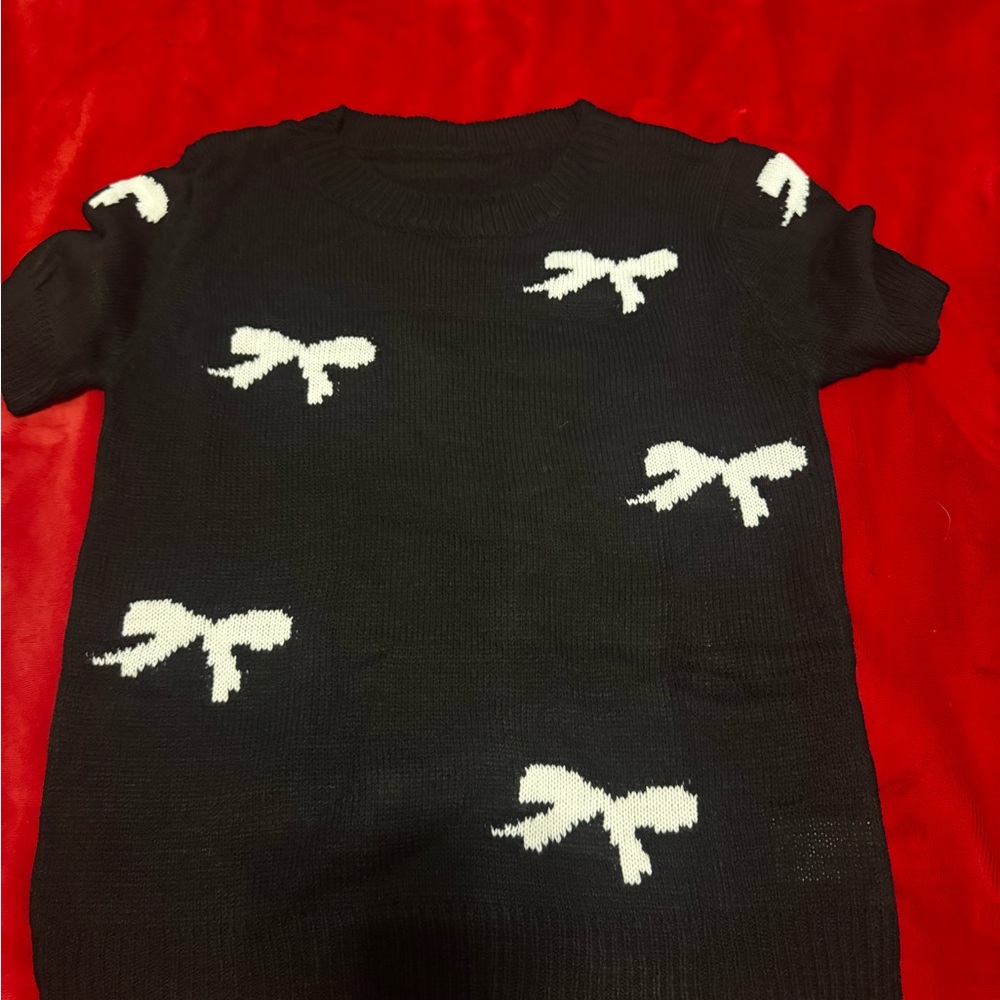Black Sweater with White Bow Accents